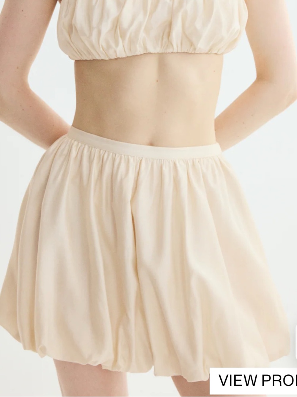 Women's Cream Bubble-Hem Mini Skirt